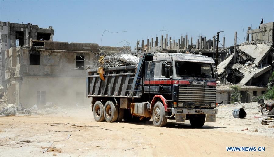 SYRIA-DAMASCUS-HARASTA-RUBBLE-REMOVAL