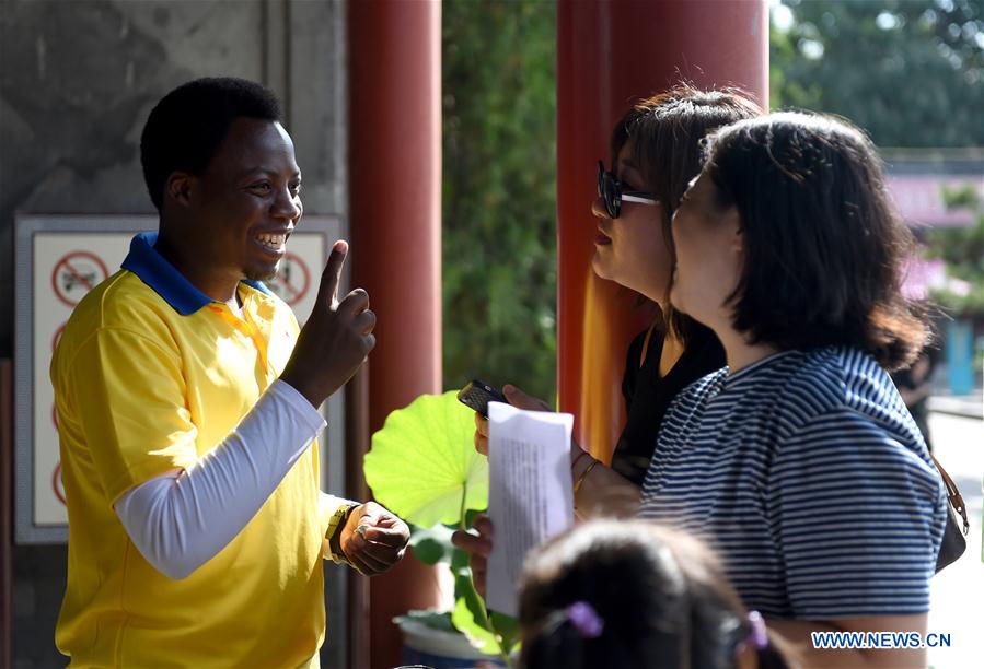 CHINA-BEIJING-YUANMINGYUAN PARK-AFRICAN VOLUNTEERS (CN)