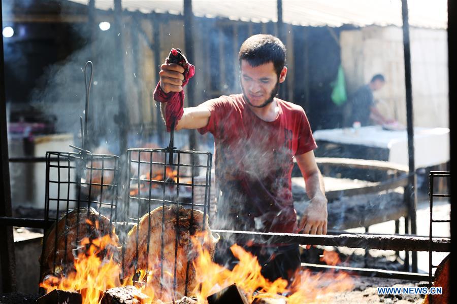 IRAQ-BAGHDAD-MASGOUF-GRILLED FISH