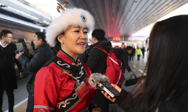 Deputies to 13th NPC arrive in Beijing