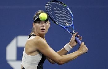 US Open: Sharapova beats Schnyder 2-0