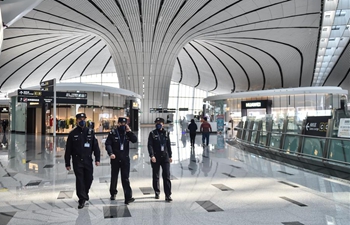 Pic story: Policeman patrol at Daxing International Airport in battle against coronavirus