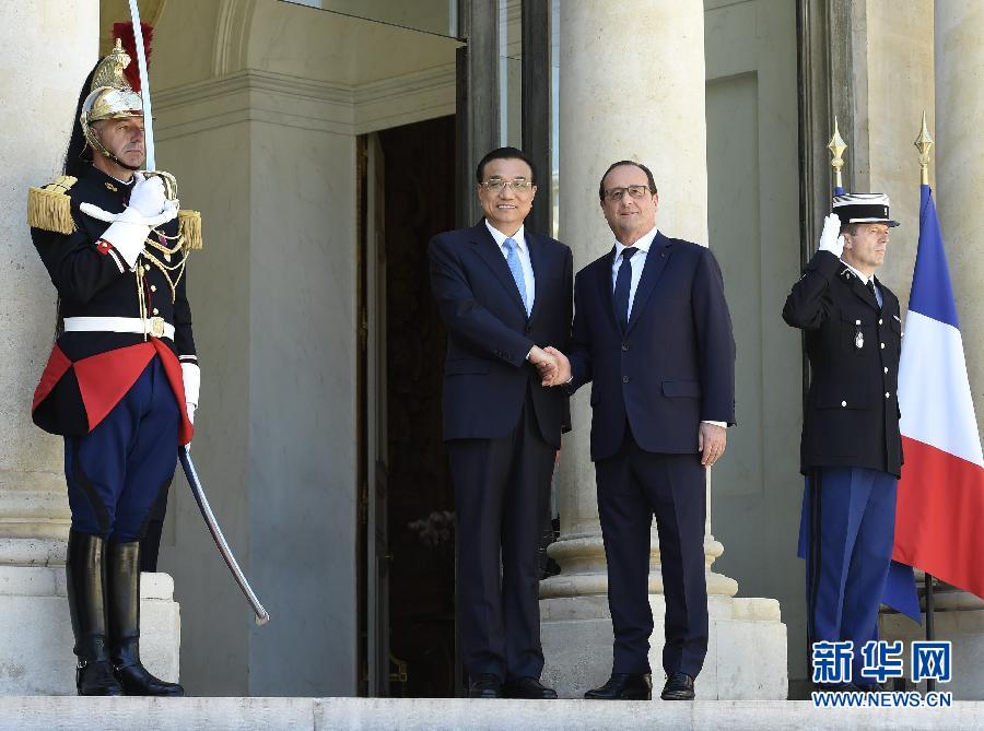 当地时间6月30日下午，国务院总理李克强在巴黎爱丽舍宫会见法国总统奥朗德。 新华社记者李学仁摄